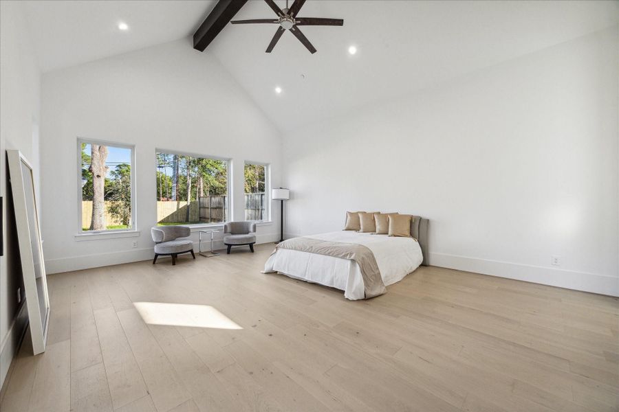 Primary Bedroom with sitting area and backyard access Primary Bedroom with sitting area and backyard access