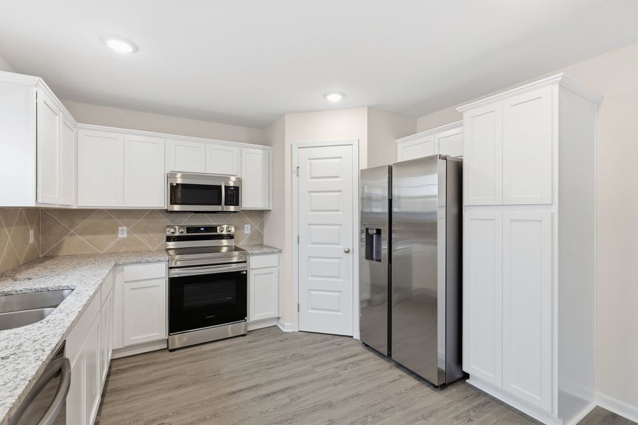 Representative furnished interior of a home built from the The Pamona by RTS Homes in Grand Reserve, Hinesville (Image 6). Representative furnished interior of a home built from the The Pamona by RTS Homes in Grand Reserve, Hinesville (Image 6).