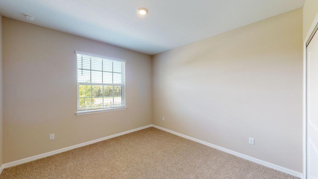 Representative unfurnished interior of a home built from the Caserta VII by Taylor Morrison in Esplanade at Rivergrass Condos, Naples (Image 8).