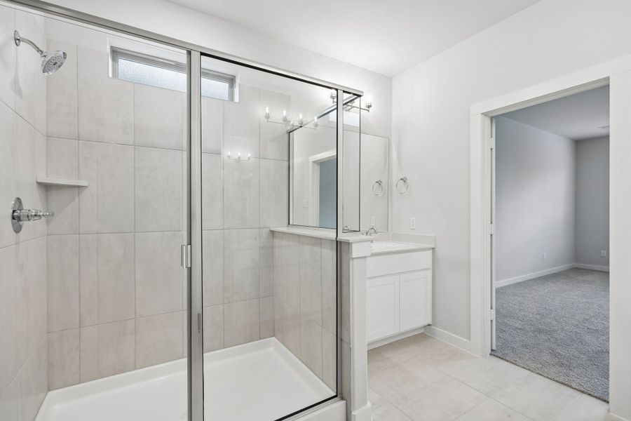 Primary Bathroom in the Winters home plan by Trophy Signature Homes – REPRESENTATIVE PHOTO