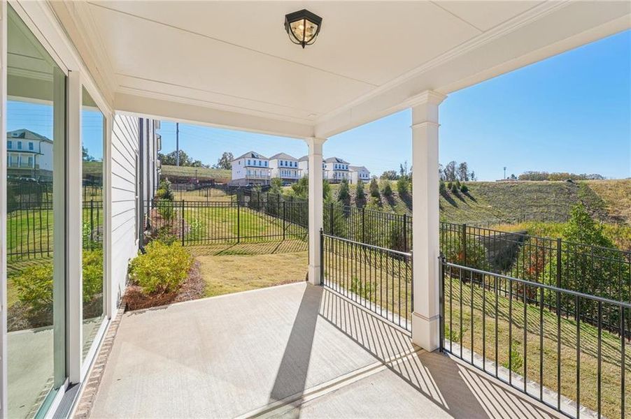 Exterior details and patio area of a home in Palisades Single Family, Cumming (Image 29).