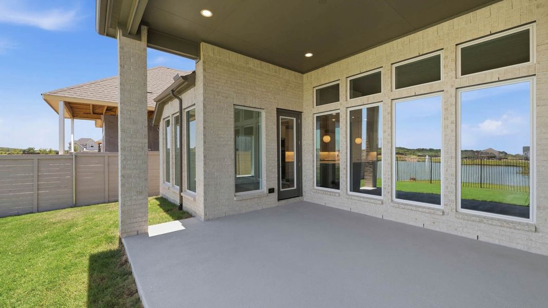 Exterior details and patio area of a home in Landmark, Denton (Image 3).