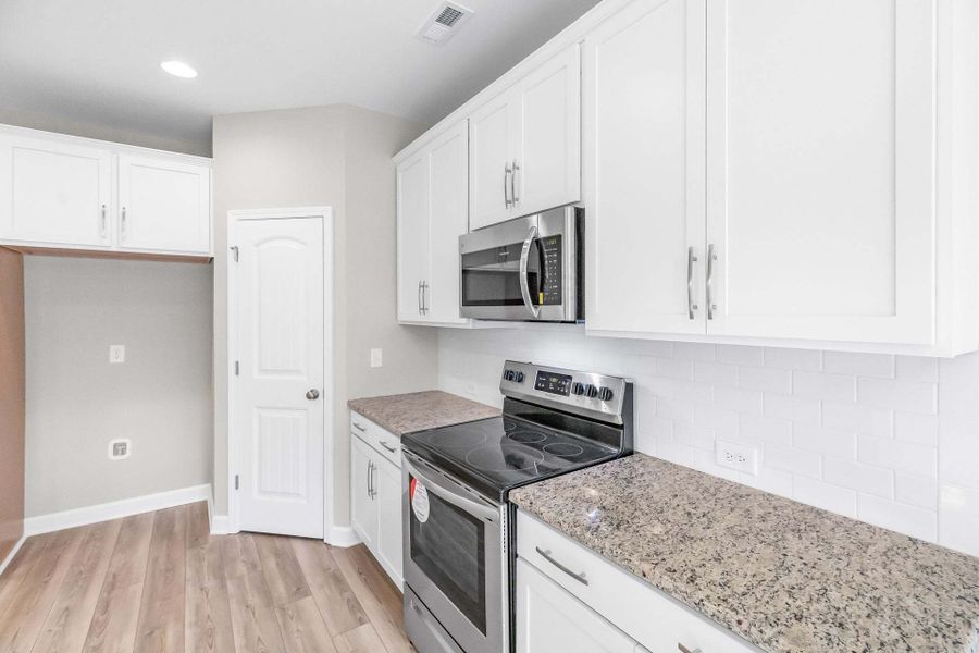 Representative furnished interior of a home built from the Springfield by Caviness & Cates Communities in Sutherland Station at Olde Liberty, Franklinton (Image 99). Representative furnished interior of a home built from the Springfield by Caviness & Cates Communities in Sutherland Station at Olde Liberty, Franklinton (Image 99).