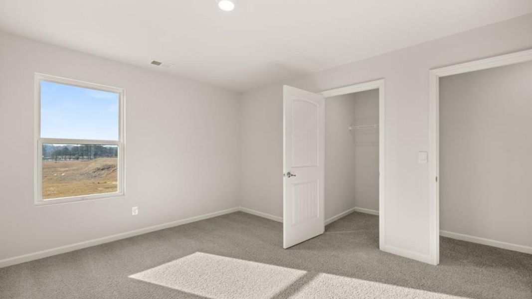 Spacious, unfurnished interior of a new home in Fairway 17 at Mirror Lake, Villa Rica (Image 24).