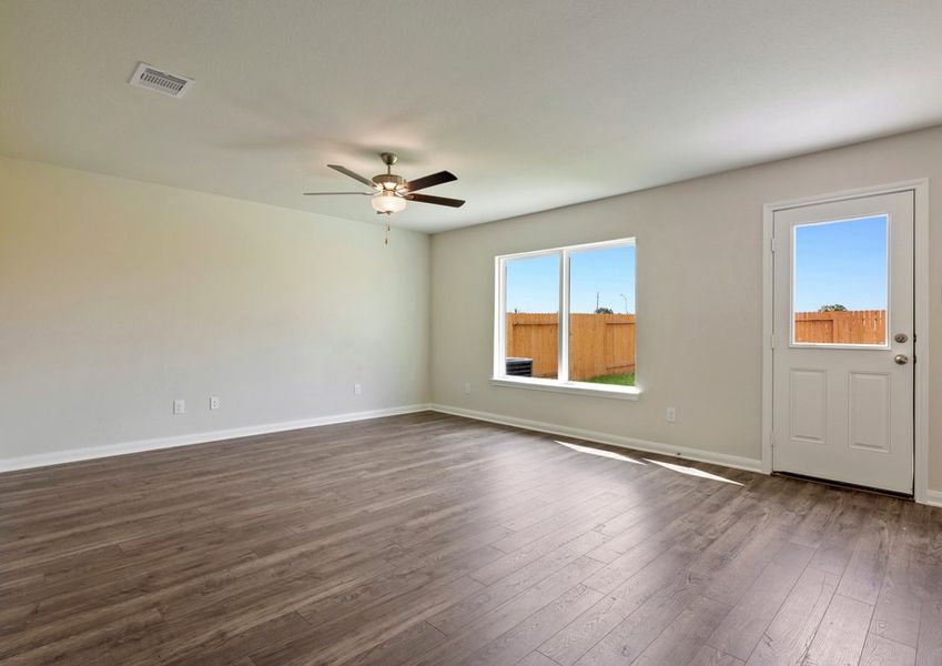 Dining room with a large window Dining room with a large window