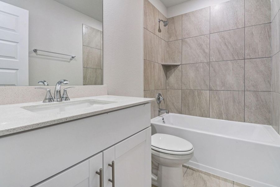 Furnished interior view inside a new home in Landing Meadows - Traditional Series, New Caney (Image 8). Furnished interior view inside a new home in Landing Meadows - Traditional Series, New Caney (Image 8).