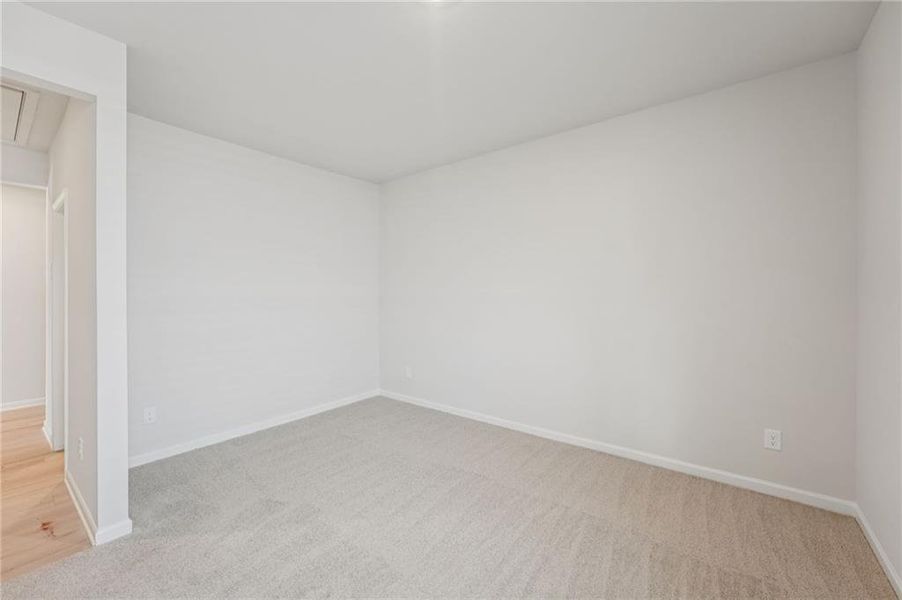 Spacious, unfurnished interior of a new home in Westmont Preserve, Powder Springs (Image 36).