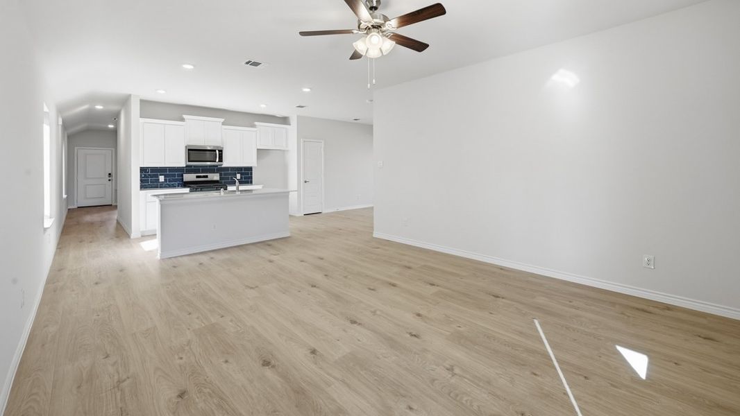 Representative unfurnished interior of a home built from the Orion by D.R. Horton in Windchime, Celina (Image 9).