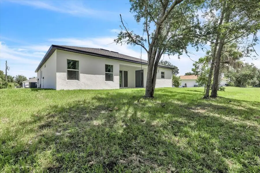 Exterior details and patio area of a home in , Punta Gorda (Image 3).