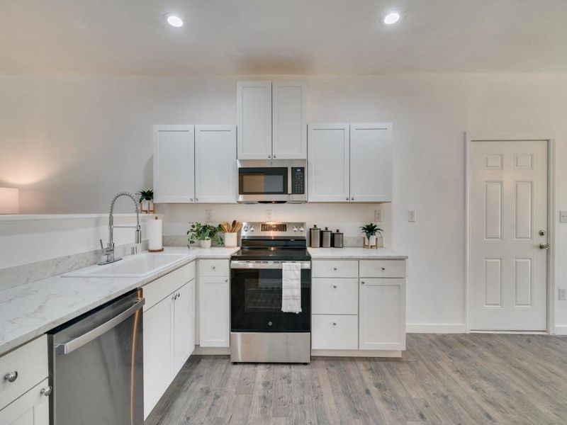 Furnished interior view inside a new home in , Commerce (Image 7). Furnished interior view inside a new home in , Commerce (Image 7).