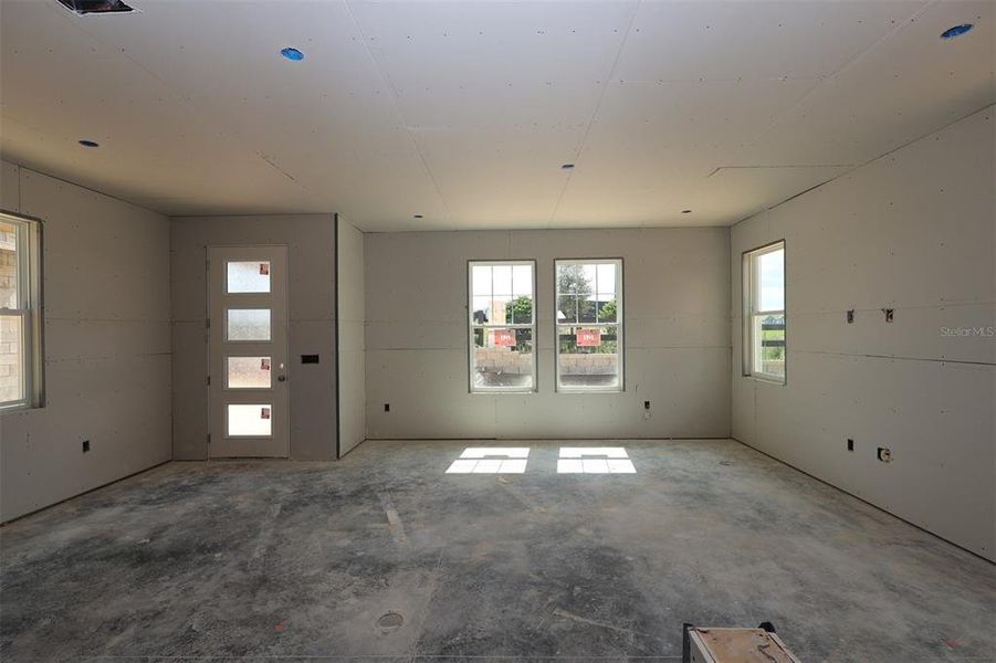 In-progress construction of a new home in Lake Star at Ovation, Winter Garden, FL (Image 18).