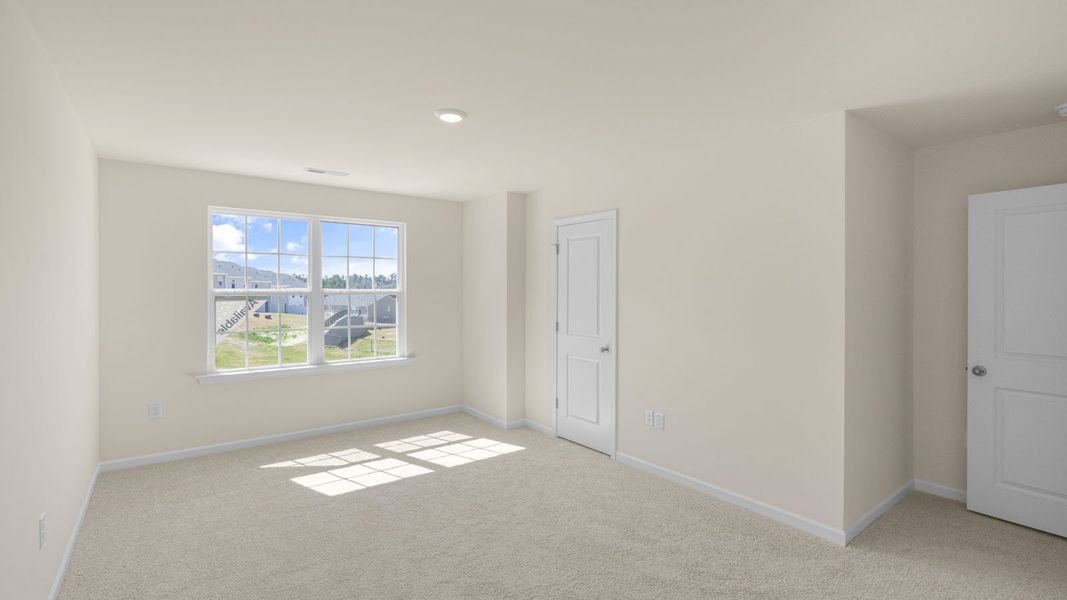 Representative unfurnished interior of a home built from the Pearson by D.R. Horton in The Townes at Ridgewood Farms, Winterville (Image 12).