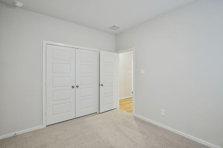 Spacious, unfurnished interior of a new home in Granger Pointe - Traditional Series, Conroe (Image 32).