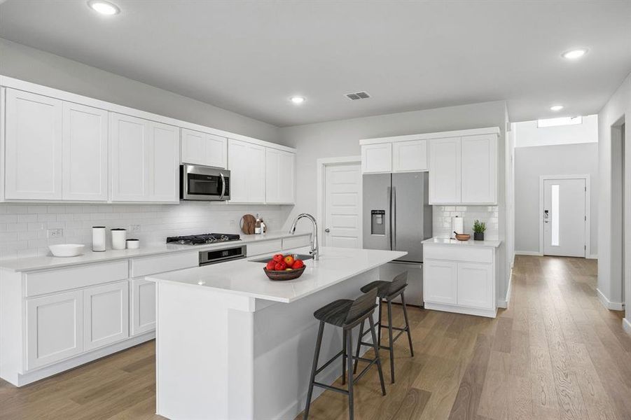 Kitchen in the Winters home plan by Trophy Signature Homes – REPRESENTATIVE PHOTO