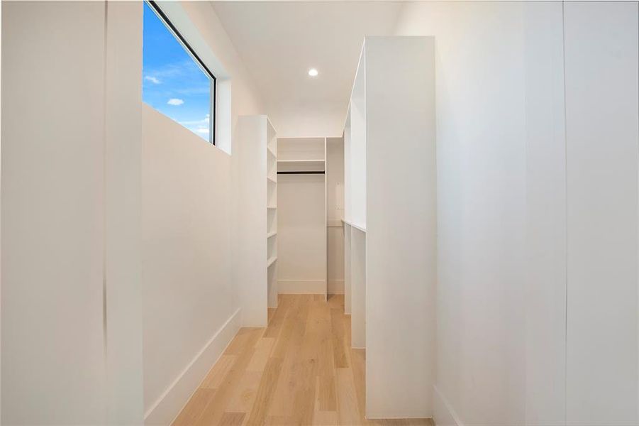 Hall with light wood-type flooring