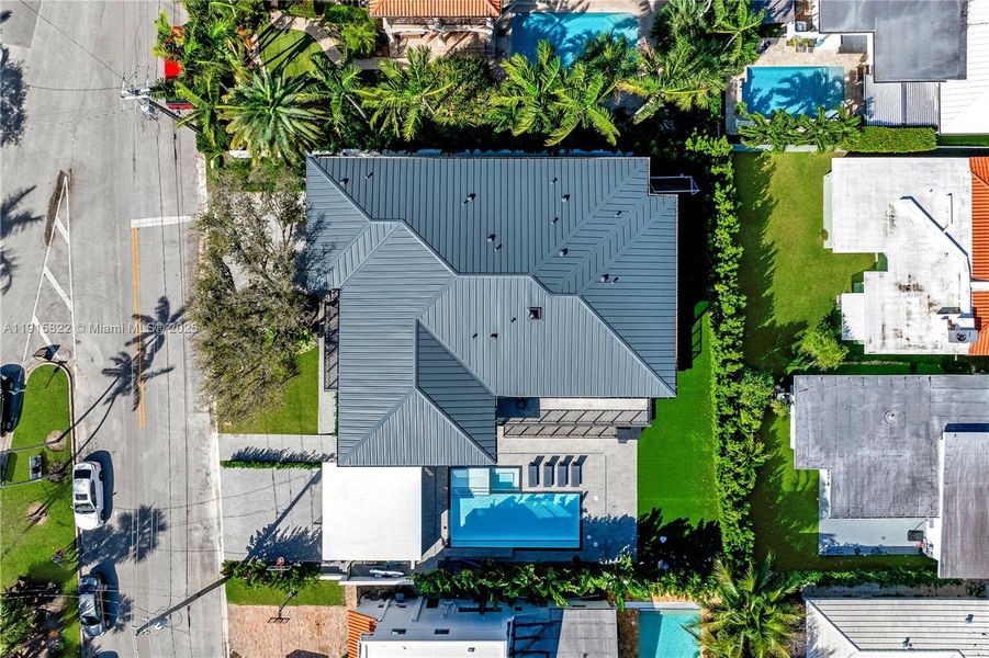 Front exterior of a new home in , Surfside, FL, highlighting curb appeal (Image 2). Front exterior of a new home in , Surfside, FL, highlighting curb appeal (Image 2).