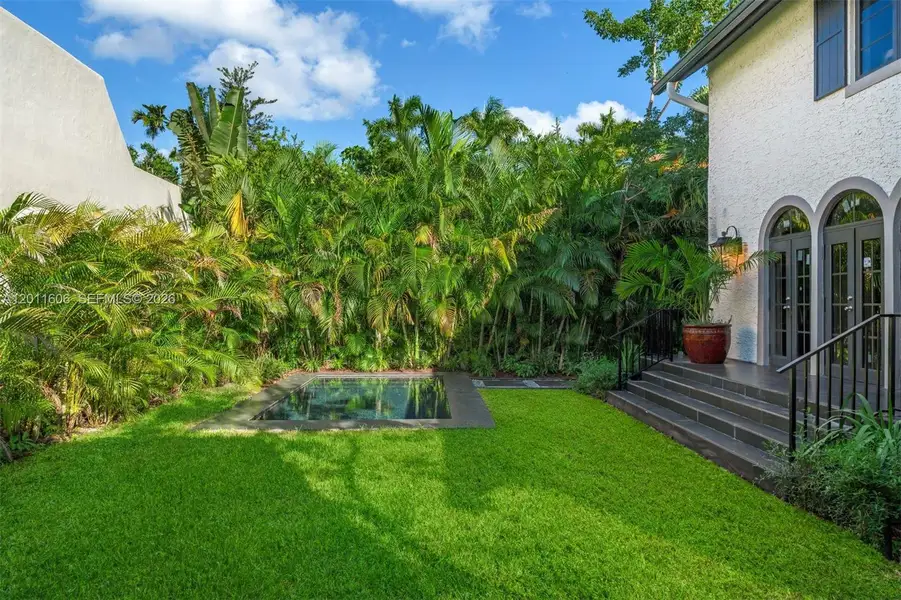 Exterior details and patio area of a home in , Miami (Image 4).