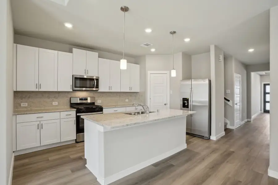 Furnished interior view inside a new home in Pine Lake Cove - Premier Series, Montgomery (Image 3).