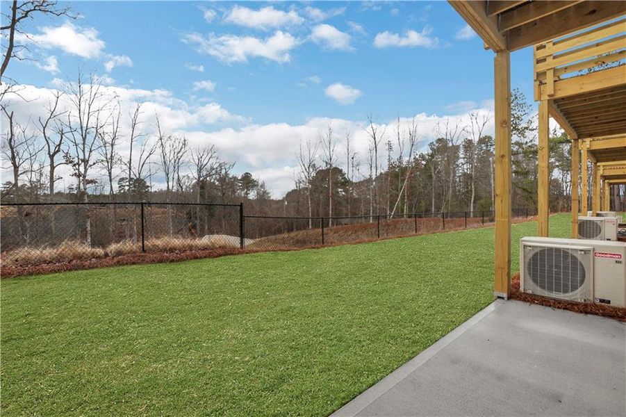 Exterior details and patio area of a home in Towne Village at Suwanee Dam, Sugar Hill (Image 3). Exterior details and patio area of a home in Towne Village at Suwanee Dam, Sugar Hill (Image 3).