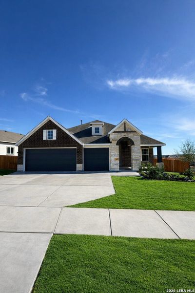 Front exterior of a new home in , New Braunfels, TX, highlighting curb appeal (Image 3).