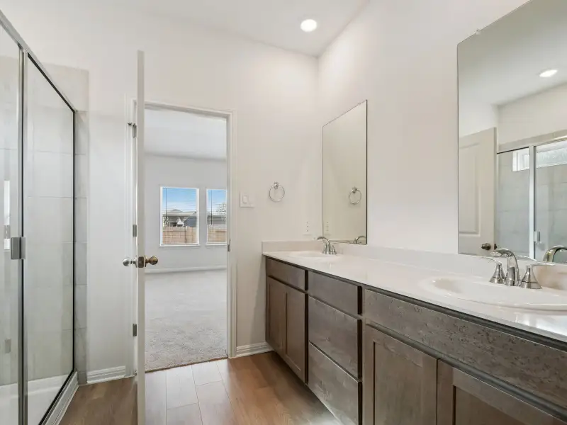 Furnished interior view inside a new home in Riverbend at Double Eagle - Reserve Collection, Cedar Creek (Image 4).