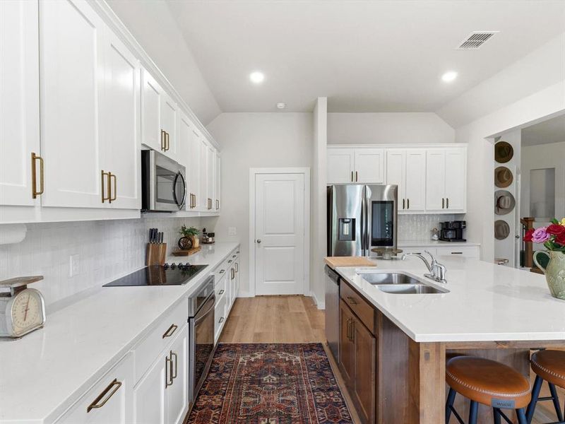 Well-appointed kitchen designed for both everyday use and entertaining with functional layout and storage.