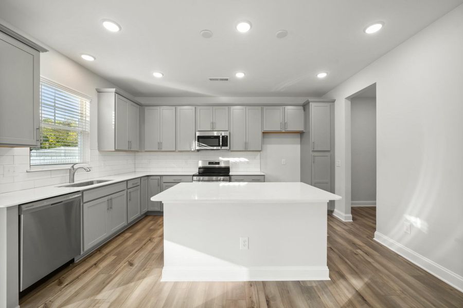 Furnished interior view inside a new home in Cottages at Piper Village, Trinity (Image 8).