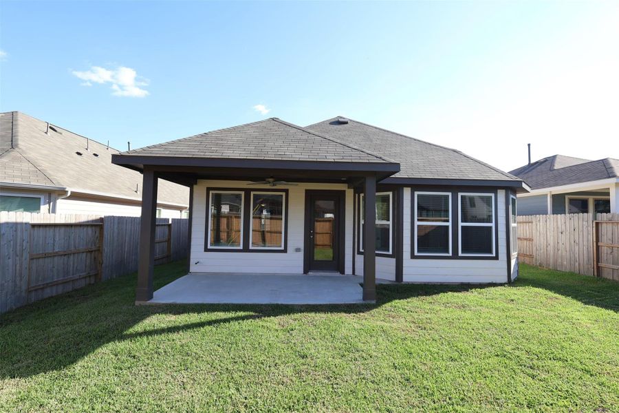 Exterior details and patio area of a home in Magnolia Ridge, Magnolia (Image 4). Exterior details and patio area of a home in Magnolia Ridge, Magnolia (Image 4).
