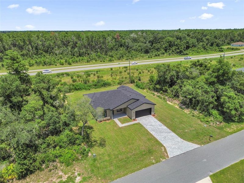 Front exterior of a new home in , Ocala, FL, highlighting curb appeal (Image 20).