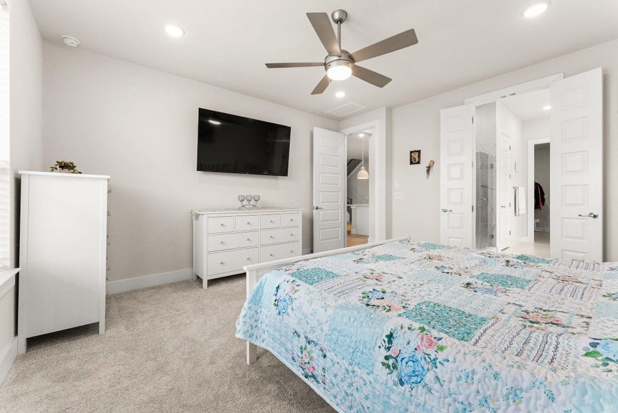 The master bedroom has a ceiling fan, recessed lighting, two-inch blinds, and a big closet which has convenient, direct access to the laundry room.