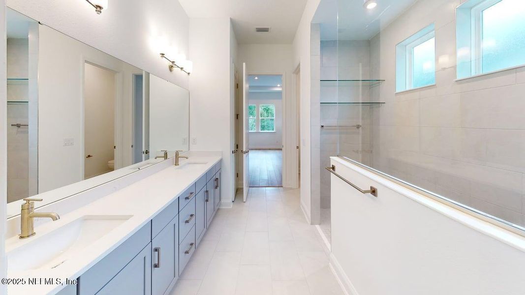 Furnished interior view inside a new home in RiverTown - WaterSong, St. Johns (Image 8).