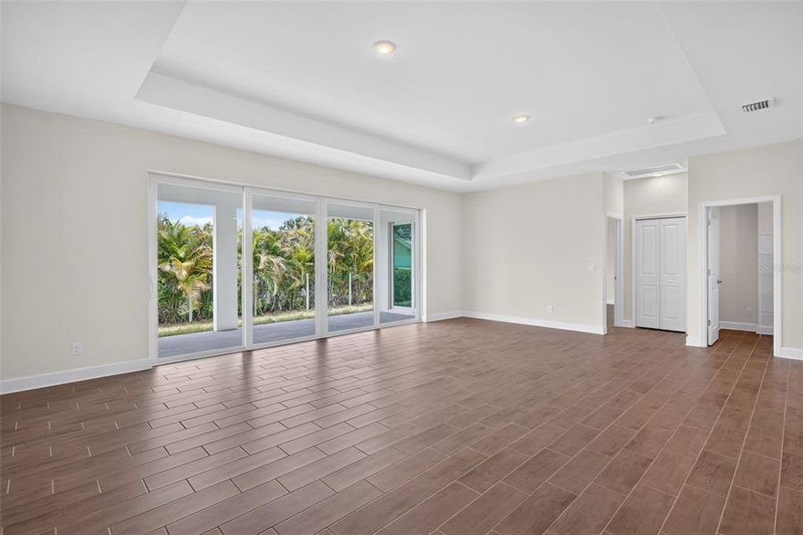 Spacious, unfurnished interior of a new home in , Port Charlotte (Image 26).