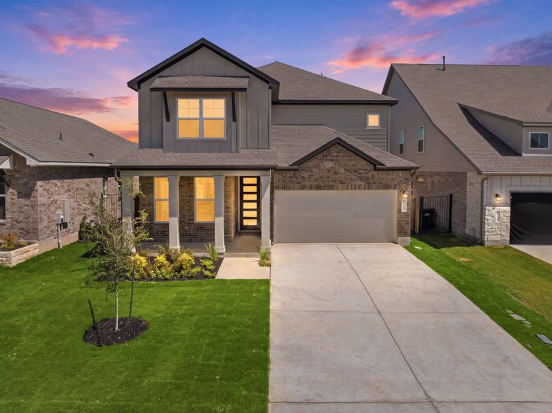 Front exterior of a new home in Santa Rita Ranch, Georgetown, TX, highlighting curb appeal (Image 1). Front exterior of a new home in Santa Rita Ranch, Georgetown, TX, highlighting curb appeal (Image 1).