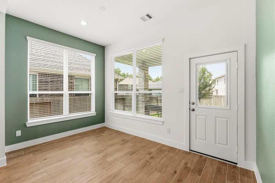 Breakfast area with access to the covered patio and backyard