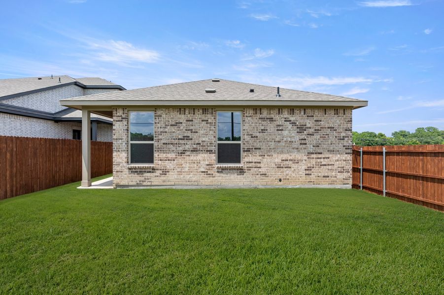 Front exterior of a new home in Churchill, Anna, TX, highlighting curb appeal (Image 19). Front exterior of a new home in Churchill, Anna, TX, highlighting curb appeal (Image 19).