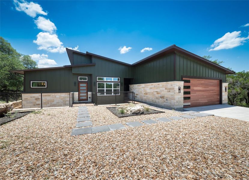 Front exterior of a new home in , Leander, TX, highlighting curb appeal (Image 1).