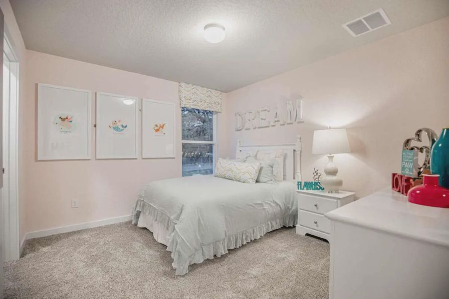 Representative furnished interior of a home built from the Pegasus by Chesmar Homes in Santa Rita Ranch, Liberty Hill (Image 11).