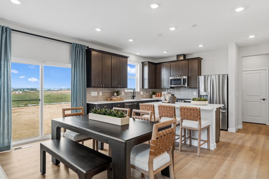 Representative furnished interior of a home built from the 4006 by Risewell Homes in Mead Crossing, Mead (Image 6).
