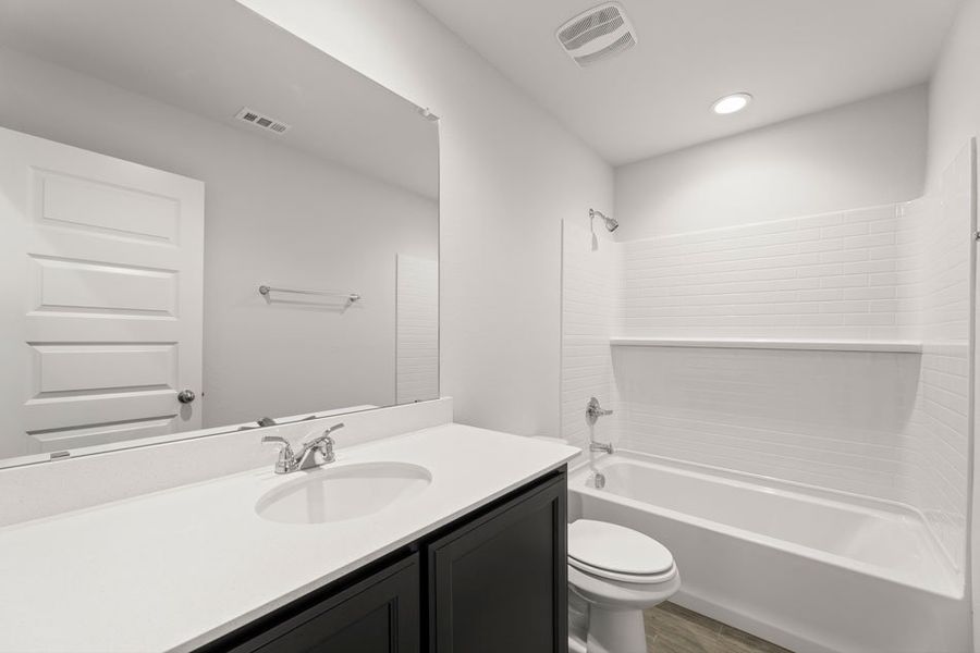 Front exterior of a new home in Northspur, Terrell, TX, highlighting curb appeal (Image 23). Front exterior of a new home in Northspur, Terrell, TX, highlighting curb appeal (Image 23).