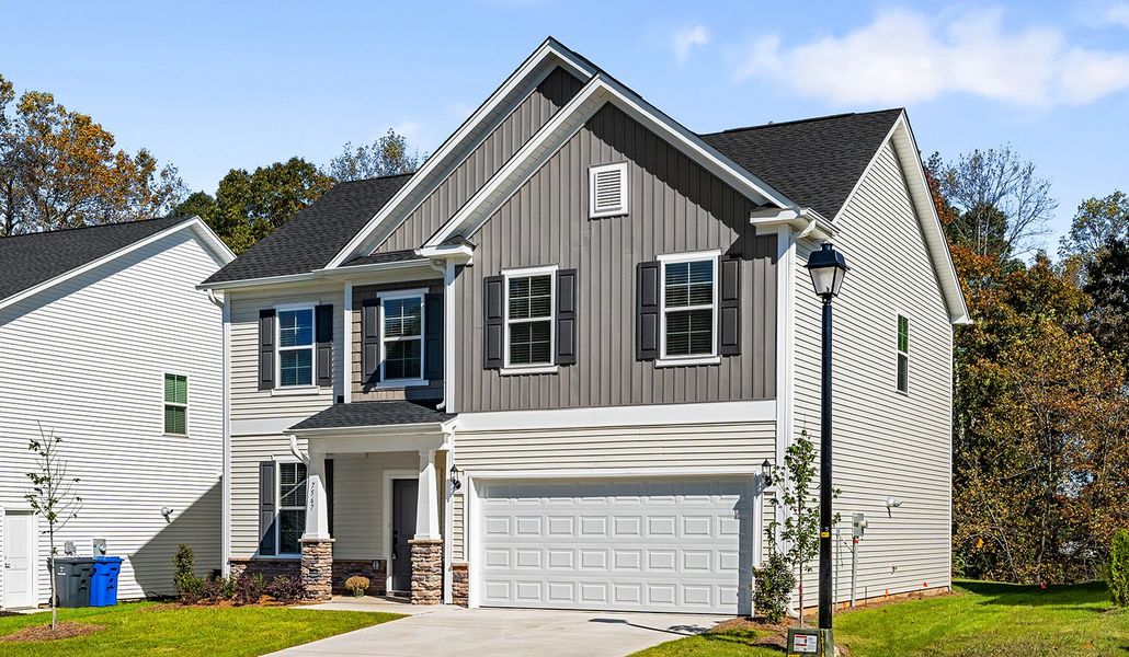 Front exterior of a new home in Watkins Landing, Kernersville, NC, highlighting curb appeal (Image 27).
