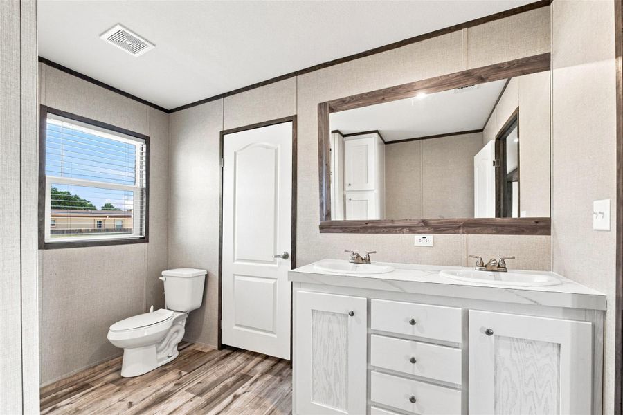 Furnished interior view inside a new home in , Conroe (Image 30).