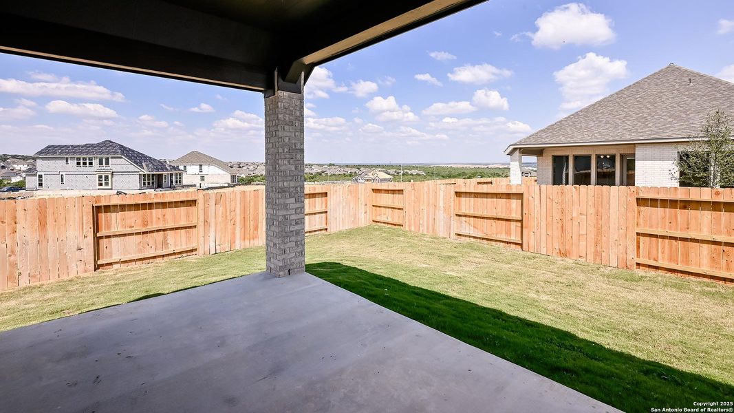 Exterior details and patio area of a home in Homestead 55', Cibolo (Image 26).