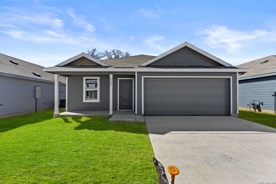 Front exterior of a new home in Friendship Oaks, Fredericksburg, TX, highlighting curb appeal (Image 1). Front exterior of a new home in Friendship Oaks, Fredericksburg, TX, highlighting curb appeal (Image 1).