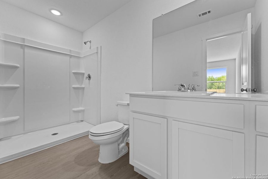 Furnished interior view inside a new home in Lodi Grove, Floresville (Image 4).