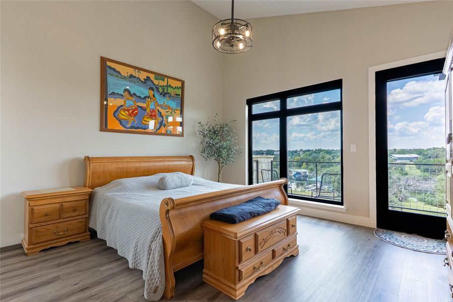 Private retreat with balcony access and serene lake views.