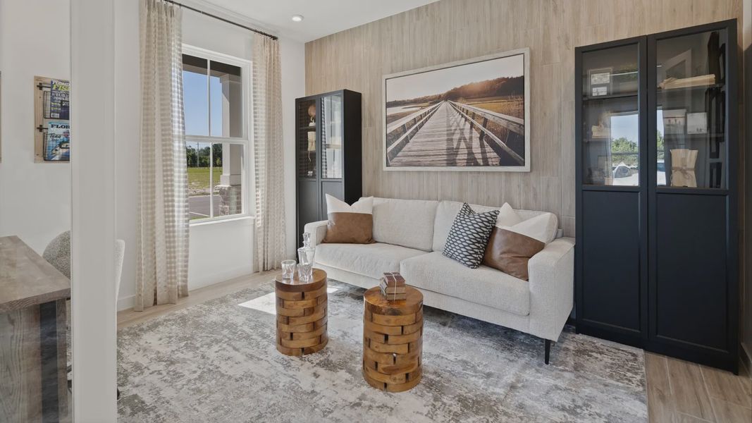 Front flex space/office with doors in a DRB Home Clementine model at the Trinity Place community.