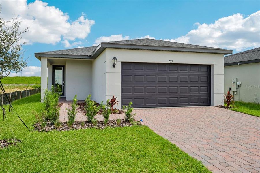 Exterior details and patio area of a home in , Haines City (Image 2). Exterior details and patio area of a home in , Haines City (Image 2).