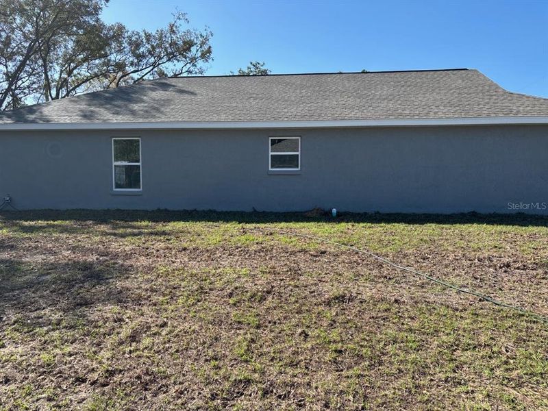Exterior details and patio area of a home in , Citrus Springs (Image 4).