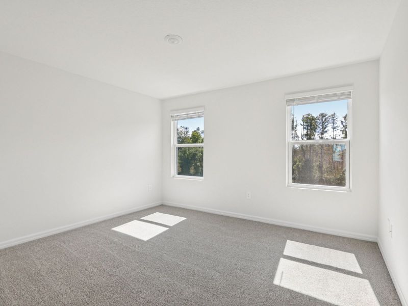 Spacious, unfurnished interior of a new home in Cagan Crossings West, Clermont (Image 9).
