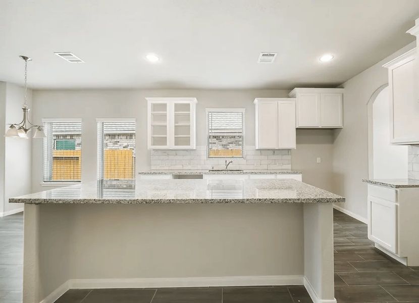 Representative furnished interior of a home built from the Madison 2434HC by Saratoga Homes in Harmony Cove, Humble (Image 4).